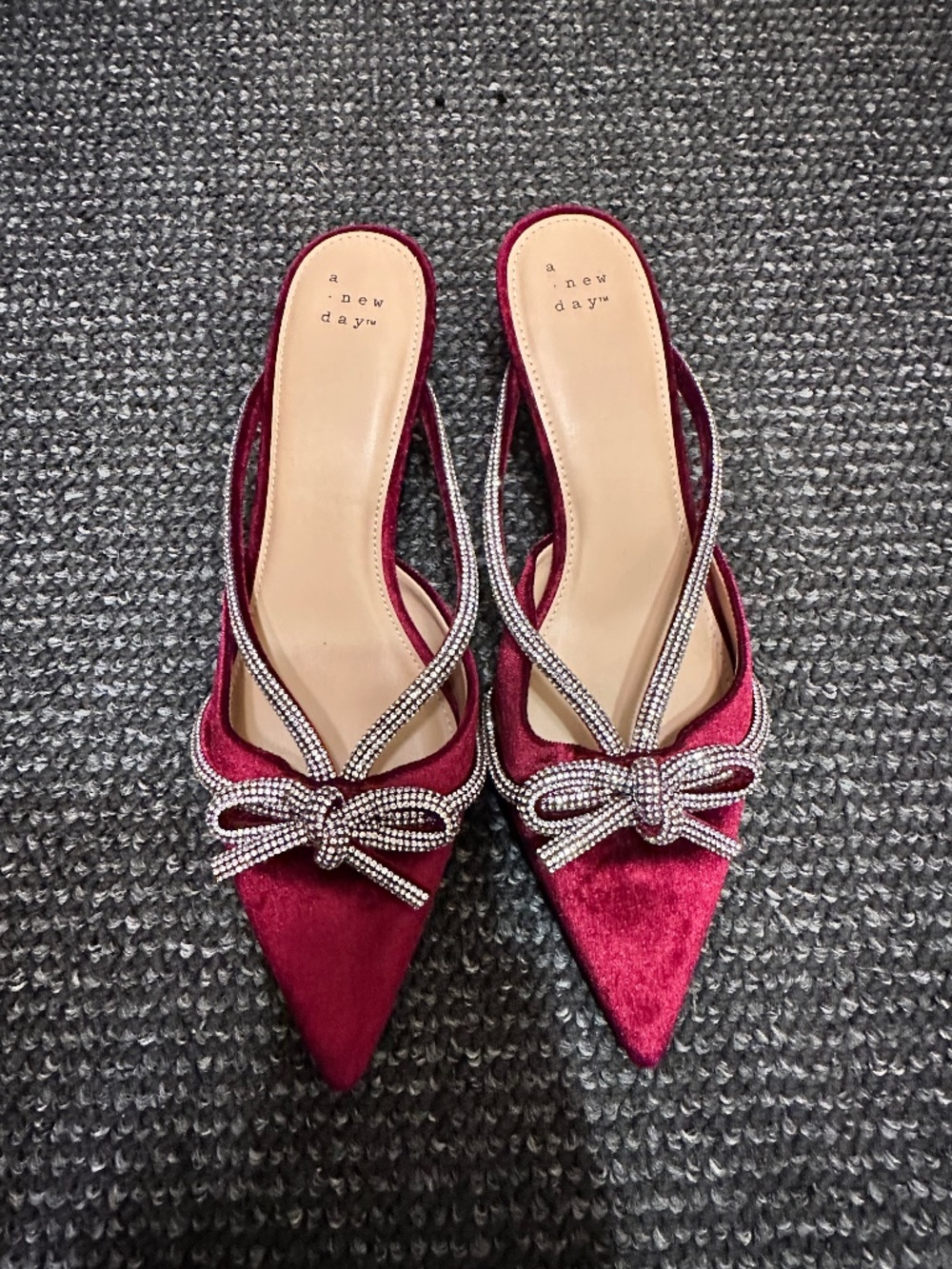 A New Day burgundy velvet Gwen heels featuring rhinestone-embellished bows. 9.5